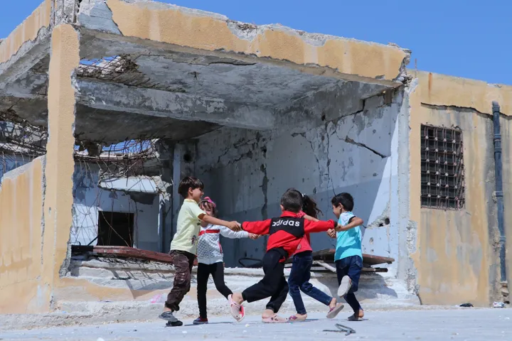 Ch1362107 Children Playing Outside Their School Idlib Syria (1)